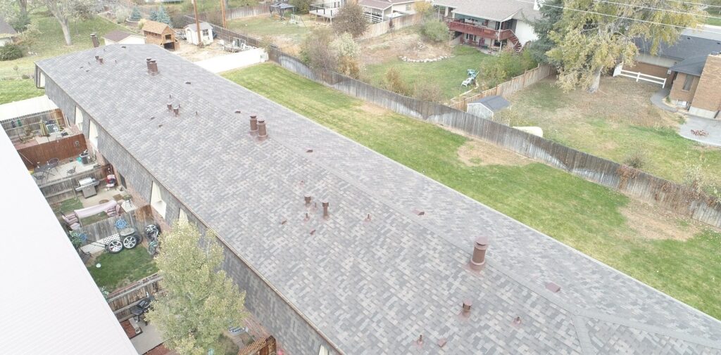 Summit Roofing Solutions , LLC, long apartment building roof Greeley