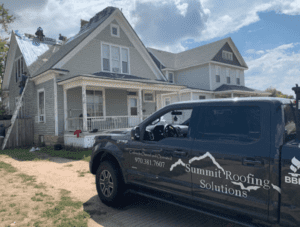 summit roofing solutions LLC roofing companies truck and house