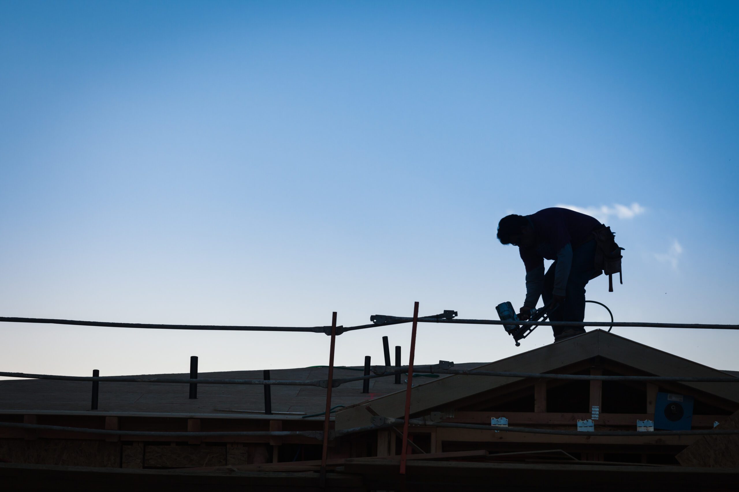 Summit Roofing crew performing a full roof replacement in Loveland, CO