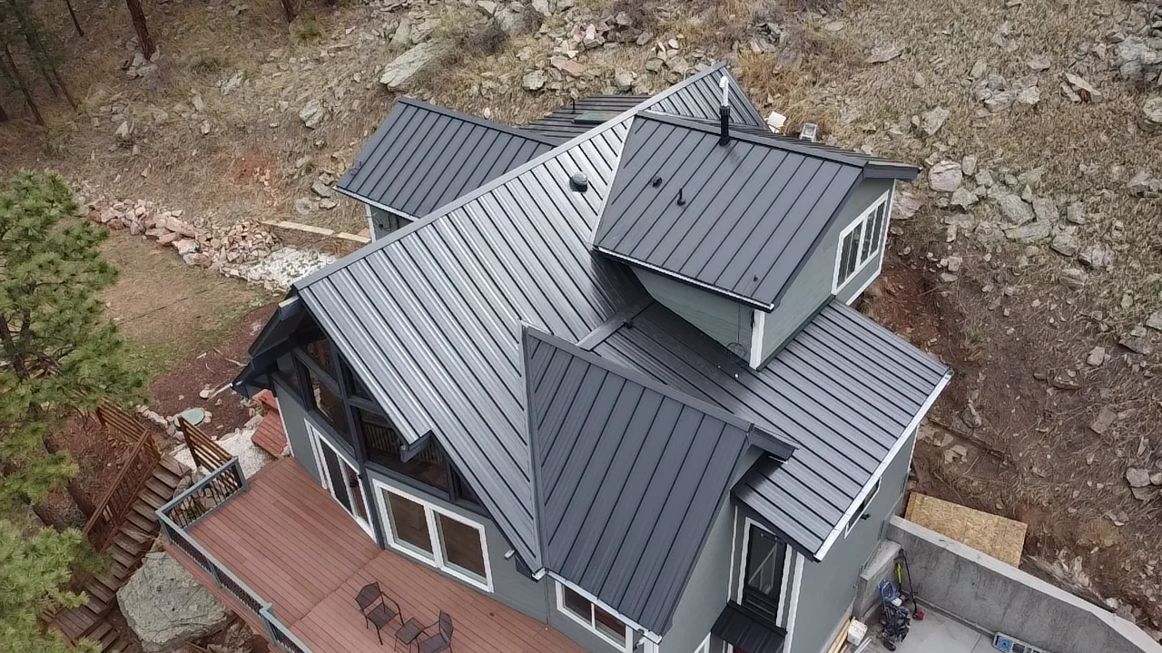 Close-up aerial view of standing seam metal roof panels installed by Summit Roofing Solutions in Northern Colorado